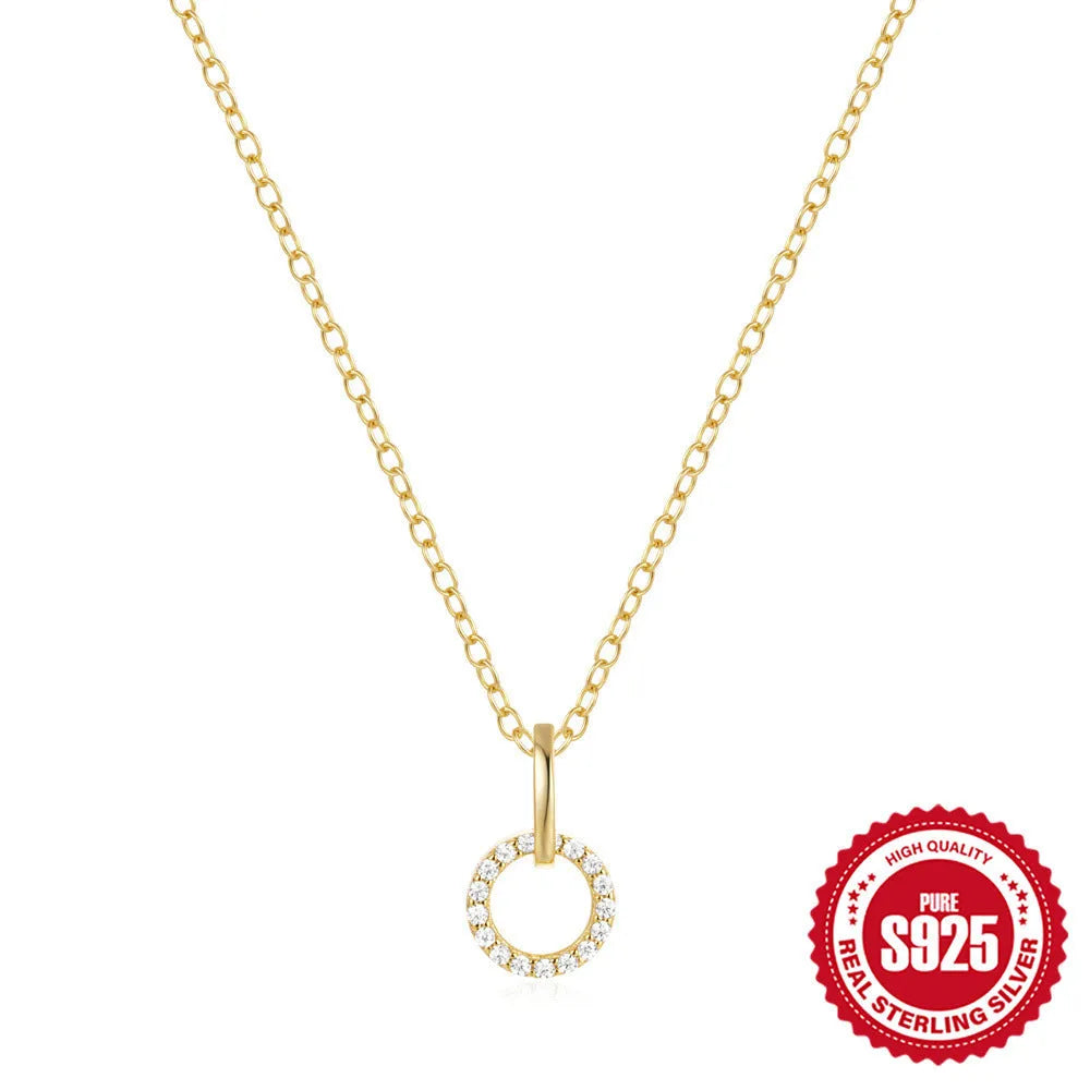 Gold colour sterling silver clavique chain necklace with interlocking zircon design on model