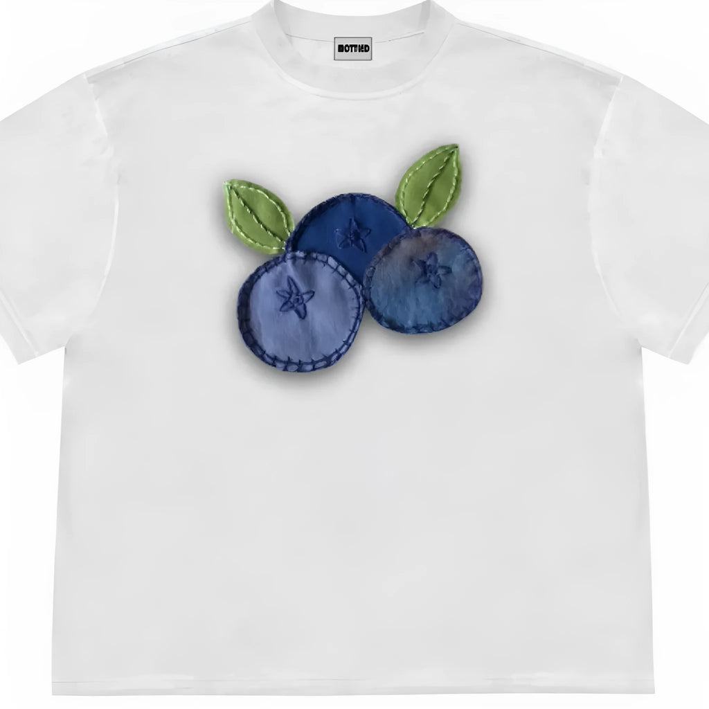 Blueberry patchwork short sleeve t-shirt in ice oxygen cotton, shown in dark coffee colour with plant and flower pattern.
