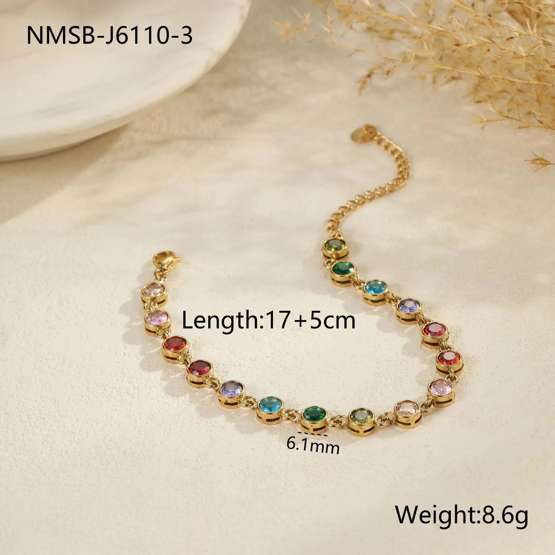 Gold and silver electroplated stainless steel bracelet with square, heart, and round geometric designs