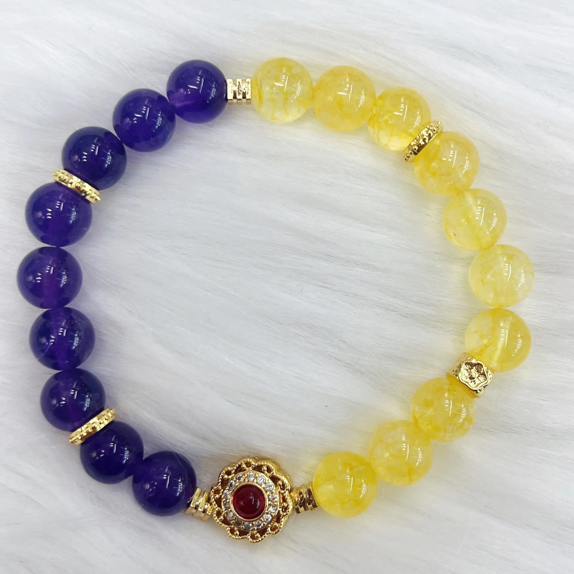 Handmade women's crystal bracelet with yellow and purple amethyst stones