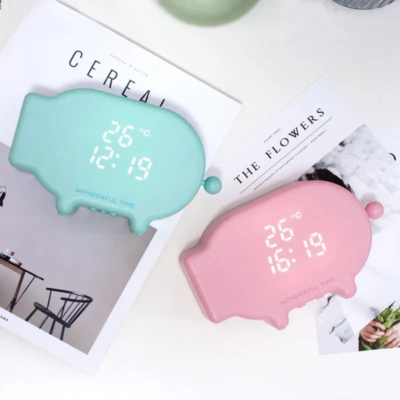 Blue multifunctional LED alarm clock showing time and temperature with USB charging cable
