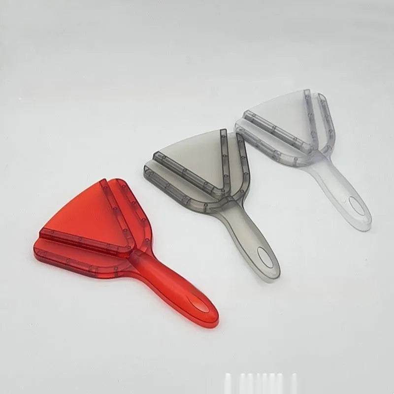Red adjustable telescopic can and bottle opener with non-slip grip on kitchen counter