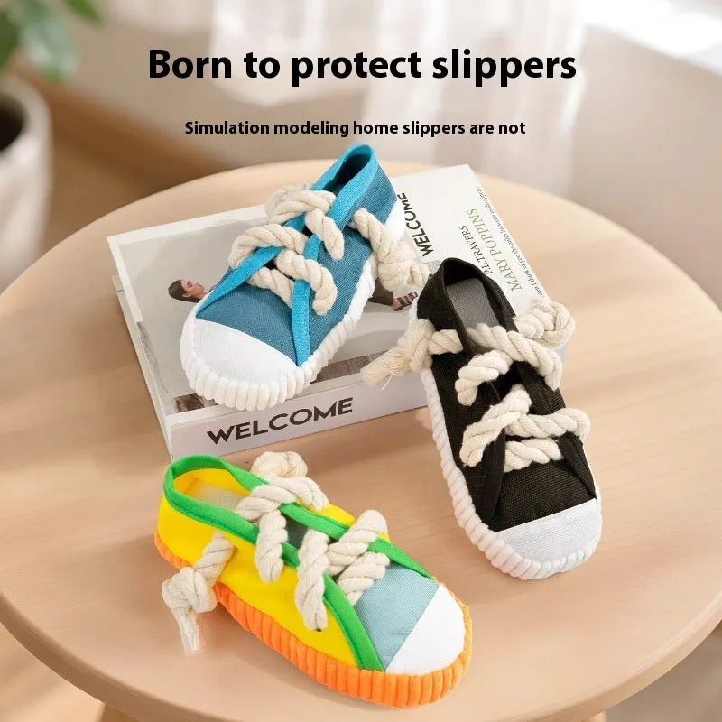Plastic dog slippers chewing toy in yellow, black or sea fog blue colours with sound activation feature