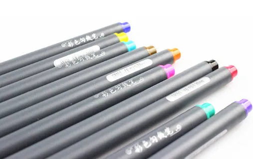 Set of ten 0.38mm fine tip technical drafting pens with syringe stroke mechanism, each 15.8cm long.