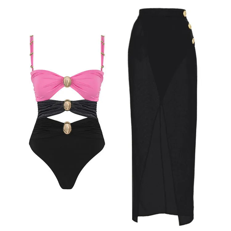 Women's one-piece swimsuit with skirt and gold button detail in solid colour