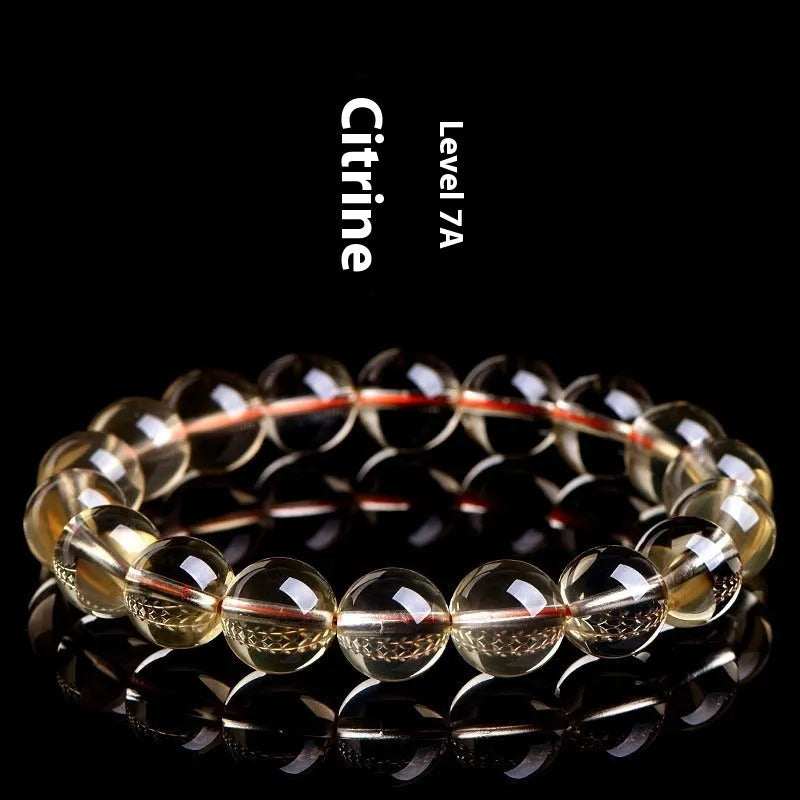 Natural citrine scattered bead and ball bracelet shown in selectable 7A or 6A grade colour.