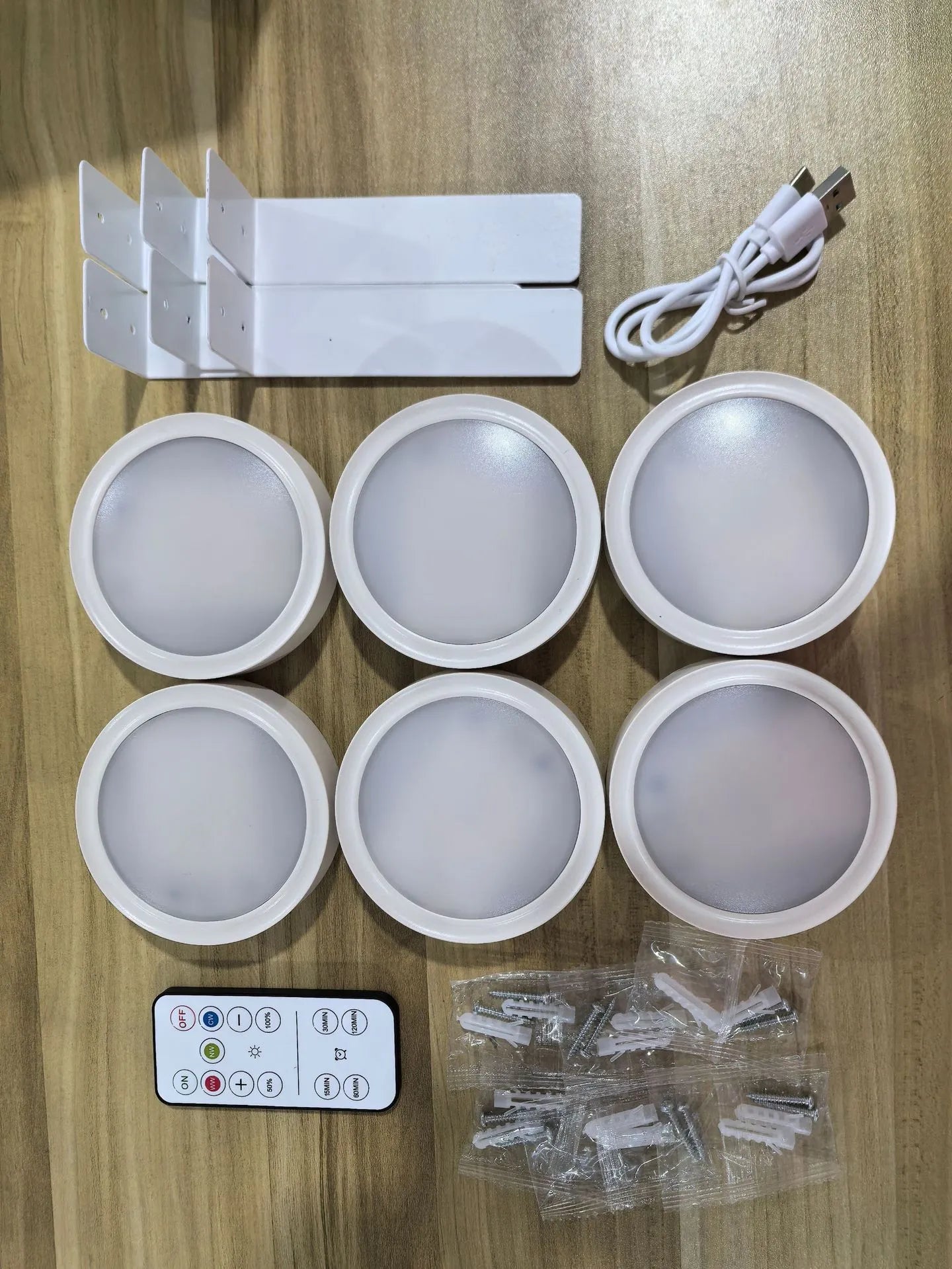 Wireless LED painting lamp with magnetic charging and remote control in black, white or gold finish