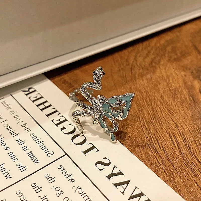 Copper women's ring featuring a creative Chinese butterfly design, available in multiple colours.