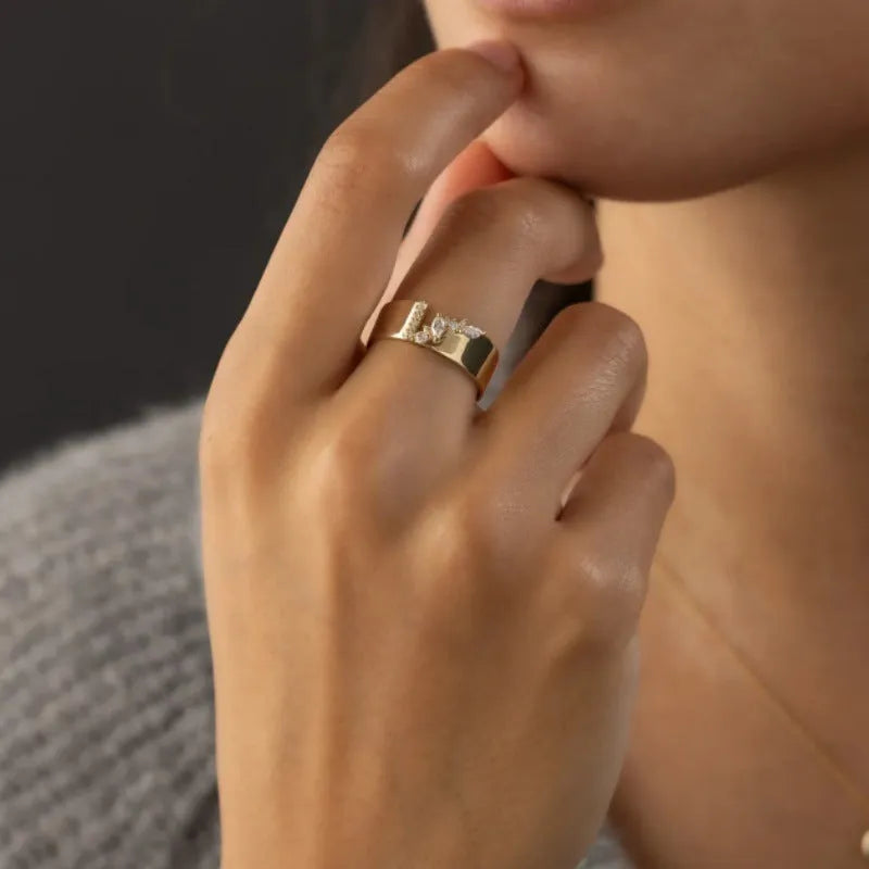 Gold electroplated zircon ring for women shown in size 8.