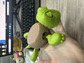 Creative green turtle-shaped ABS plastic coaster for hot drinks.
