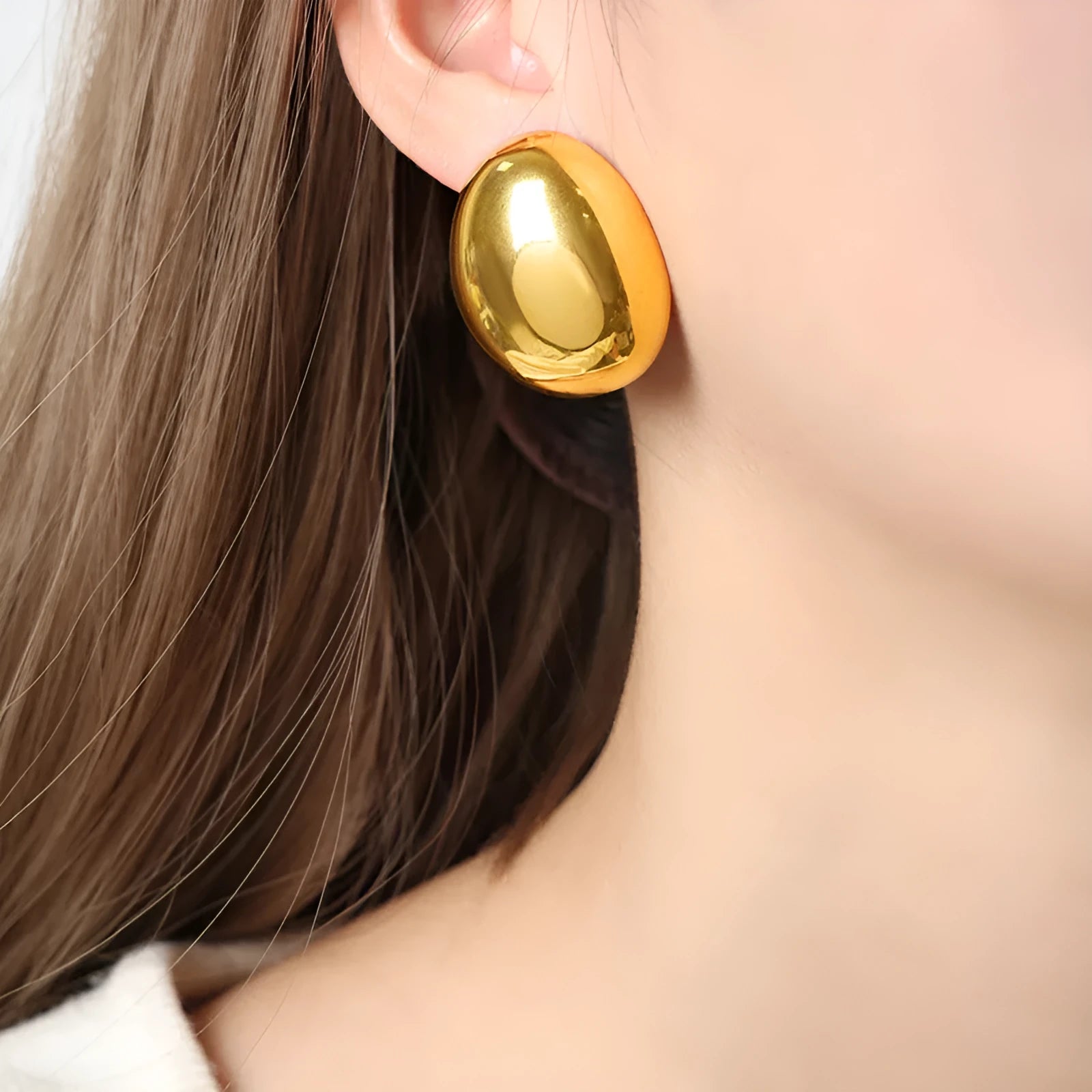 Geometric stainless steel ear studs with exaggerated glazed surface in DFE139 colour
