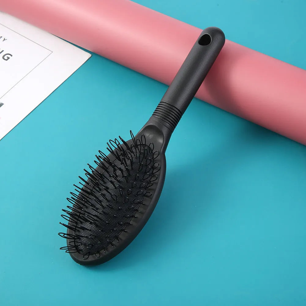 Ring tooth hair extension comb in black colour showing 22 cm length and airbag design