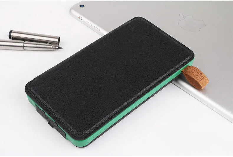 Outdoor solar phone charger in multiple colours showing solar panel, LED light, and leather finish.
