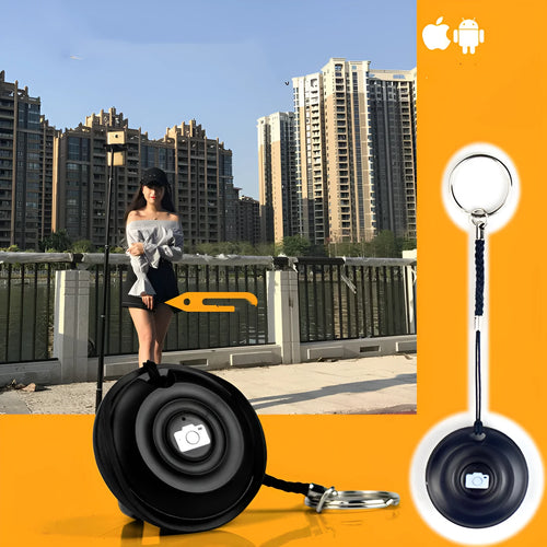 Black Bluetooth remote control selfie shutter with compact button design on PC material casing