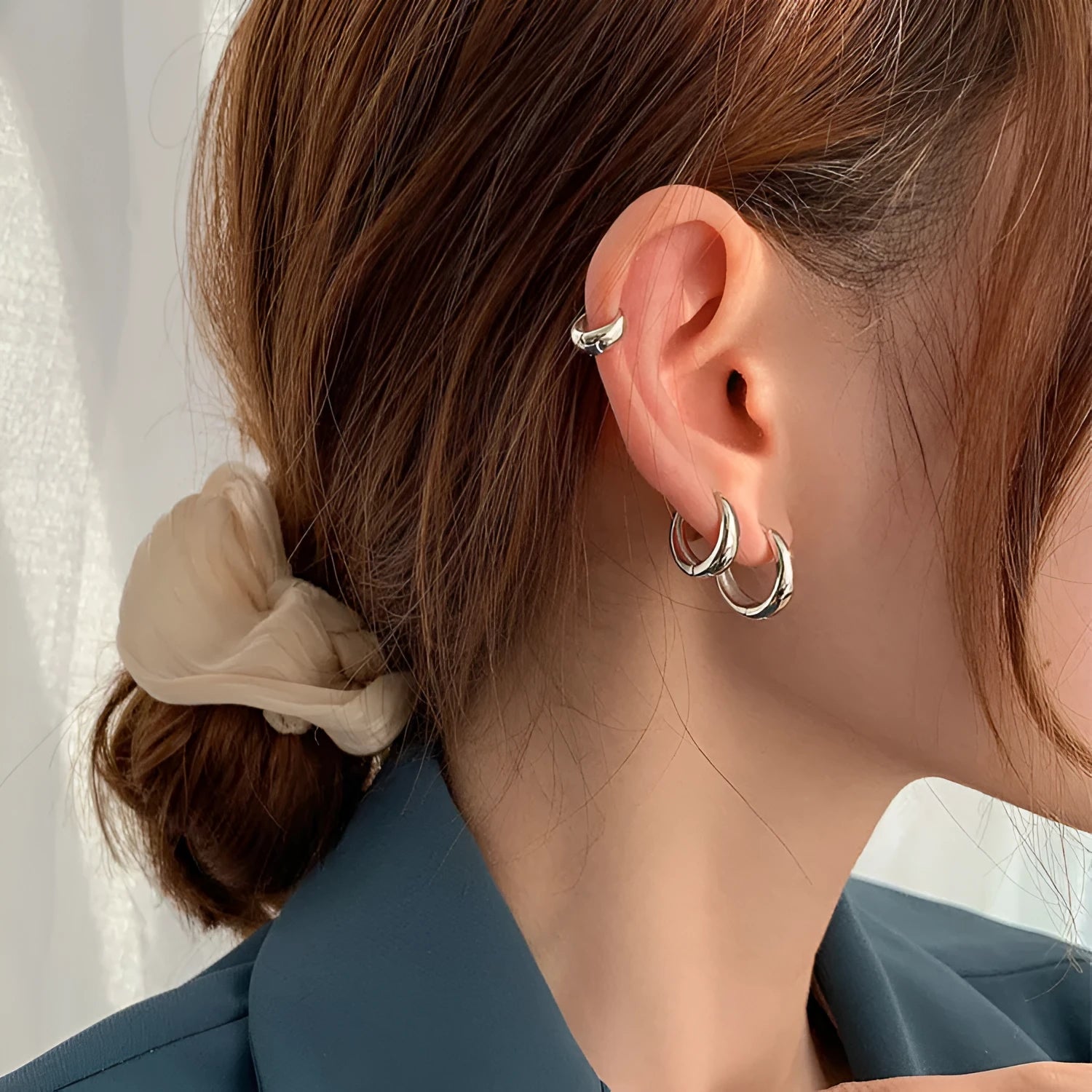 Women's geometric water drop earrings in copper with gold and silver electroplated finishes