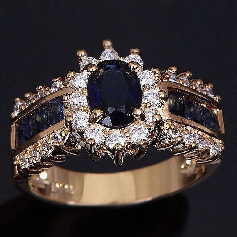 Personalised zinc alloy ring with diamond treatment in sunflower blue or square purple and blue zircon designs.