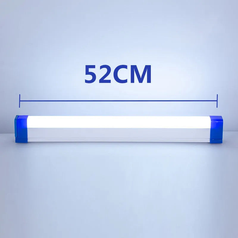 Blue and purple rechargeable LED tube light with USB cable on a dark background.