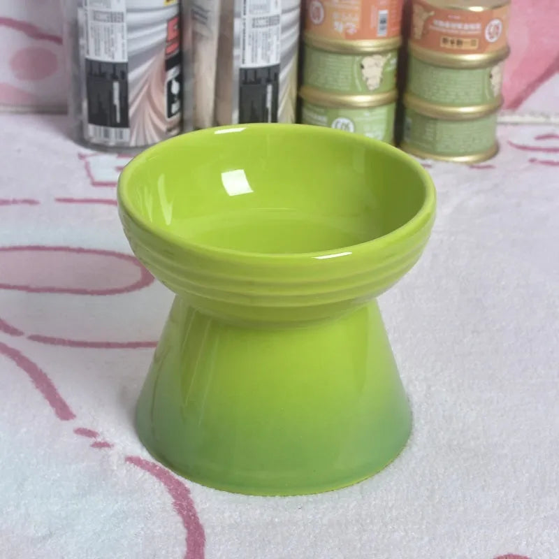 Ceramic pet bowl with anti-tumble design and raised chin support for cats and dogs