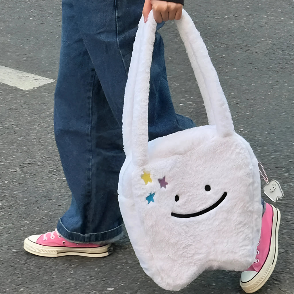 White plush shoulder tote bag with cute teeth pattern and front zip closure