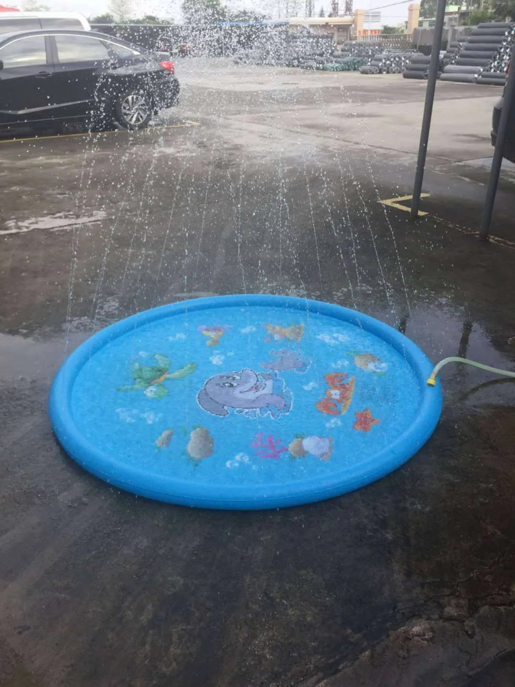 Blue PVC children's water spray play mat with marine animals, measuring 100cm by 170cm
