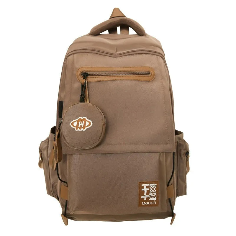 Large-capacity black nylon school backpack for junior high students with curved shoulder straps