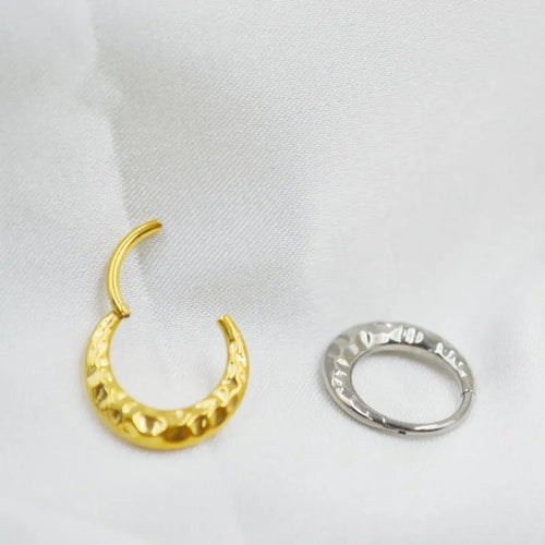 ASTM F136 titanium alloy nose ring with concave-convex carved design in gold or silver.