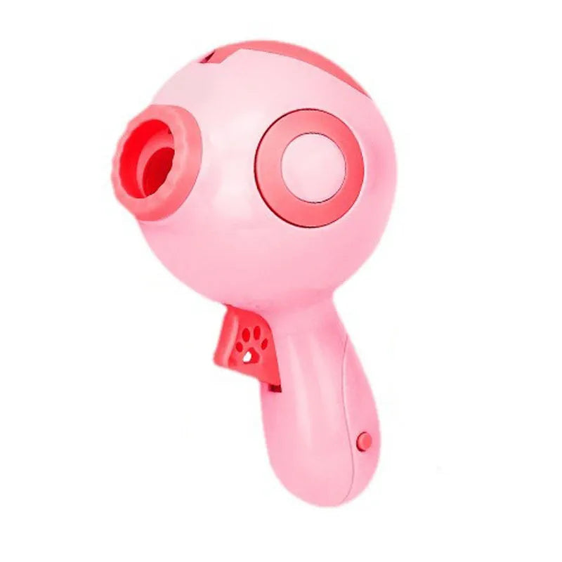 Dog treat launcher toy in green, orange, or pink colours measuring 15.5 x 9 x 8.5 cm