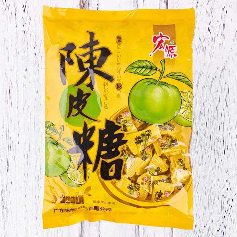 Assorted fruit flavoured hard candy bulk pack showing plum, guava, and tangerine peel varieties