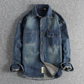 Men's vintage denim shirt in light blue washed cotton with loose fit and long sleeves