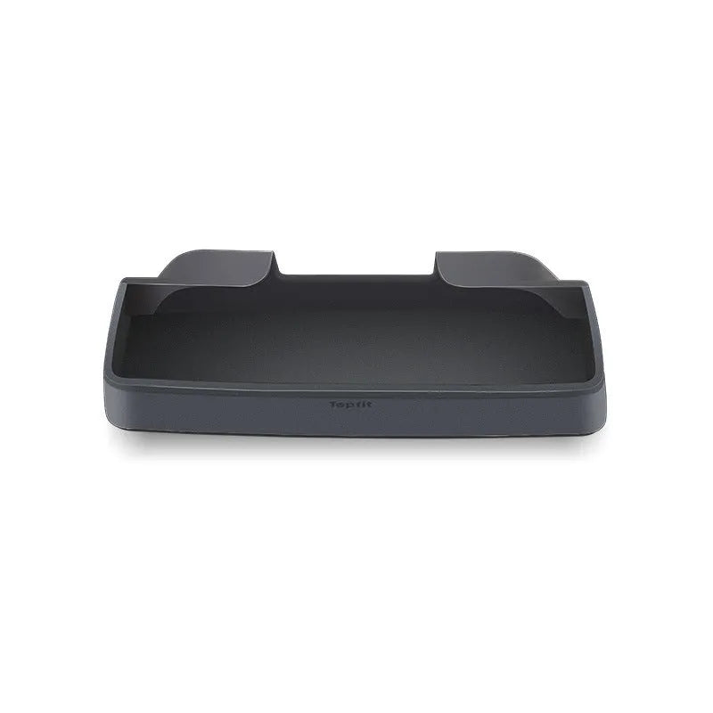 Black silicone sunglasses holder mounted on Tesla Model 3 centre console armrest