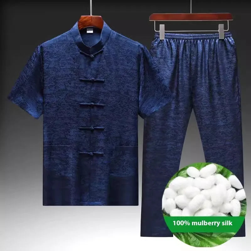 Men's mulberry silk Chinese Tang suit in light green, shown with traditional woven detailing.