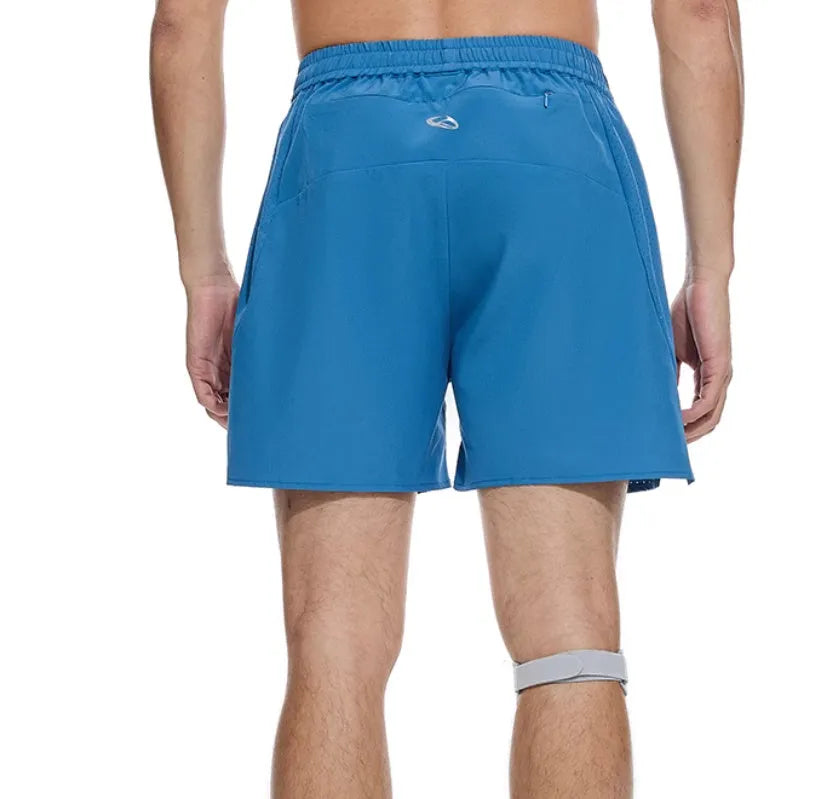 Men's black running shorts with laser stitching detail on a grey background
