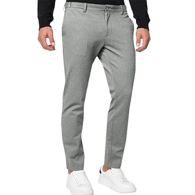 Men's slim-fit tapered chino trousers in solid colour with mid-waist design