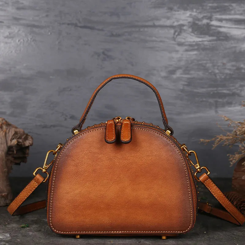 Vintage suede leather handbag in Bean Shahong colour showing internal ID pocket and mobile phone compartment.
