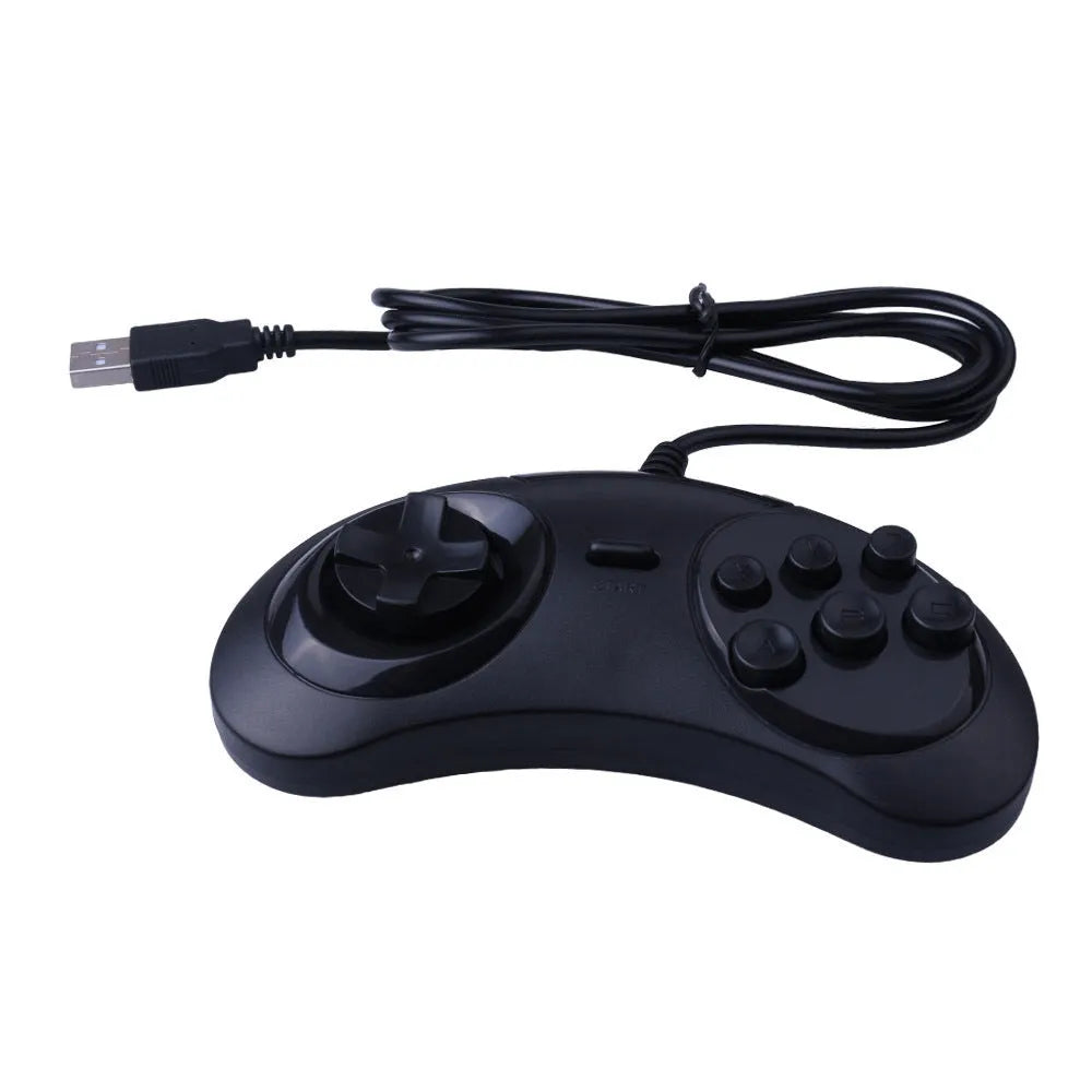 Black Sega USB computer game controller with 1.8m cable on a desk.