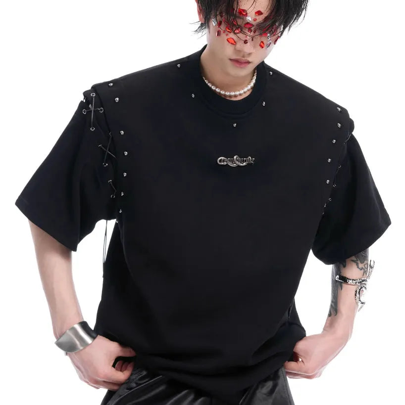 Women's short sleeve top with side lace-up detail and geometric cutouts in black colour