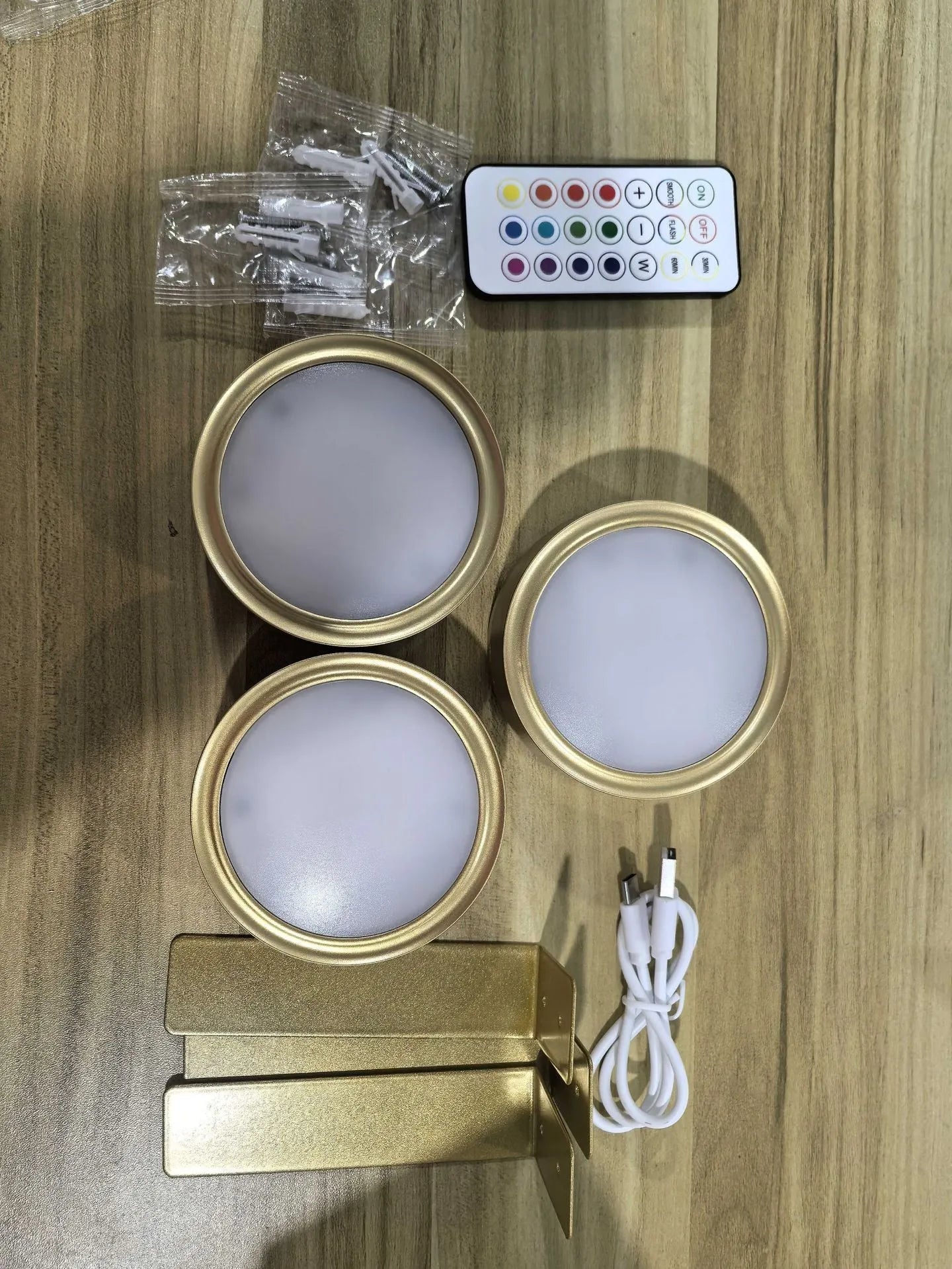Wireless LED painting lamp with magnetic charging and remote control in black, white or gold finish