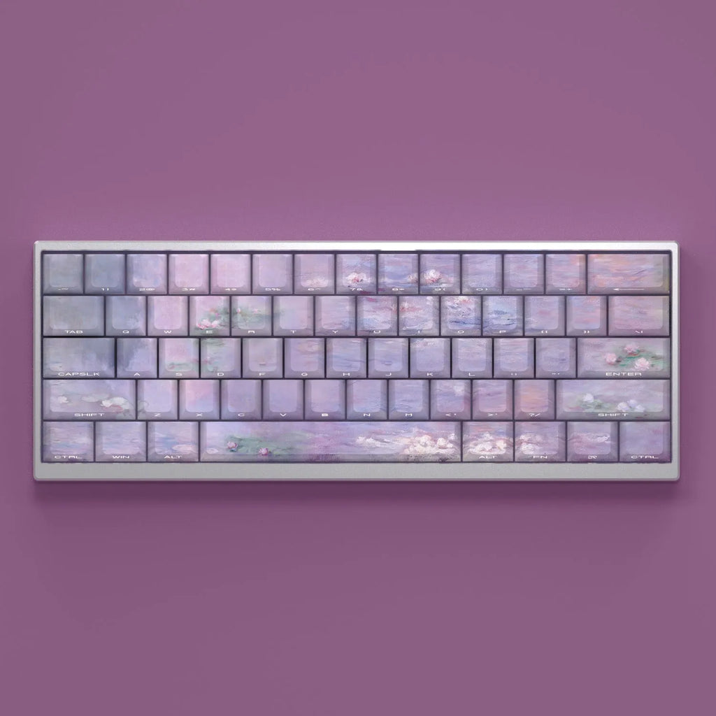 Wenshao Sleeping Lotus PBT key cap set showing side-carved transparent characters and complete 130-key layout