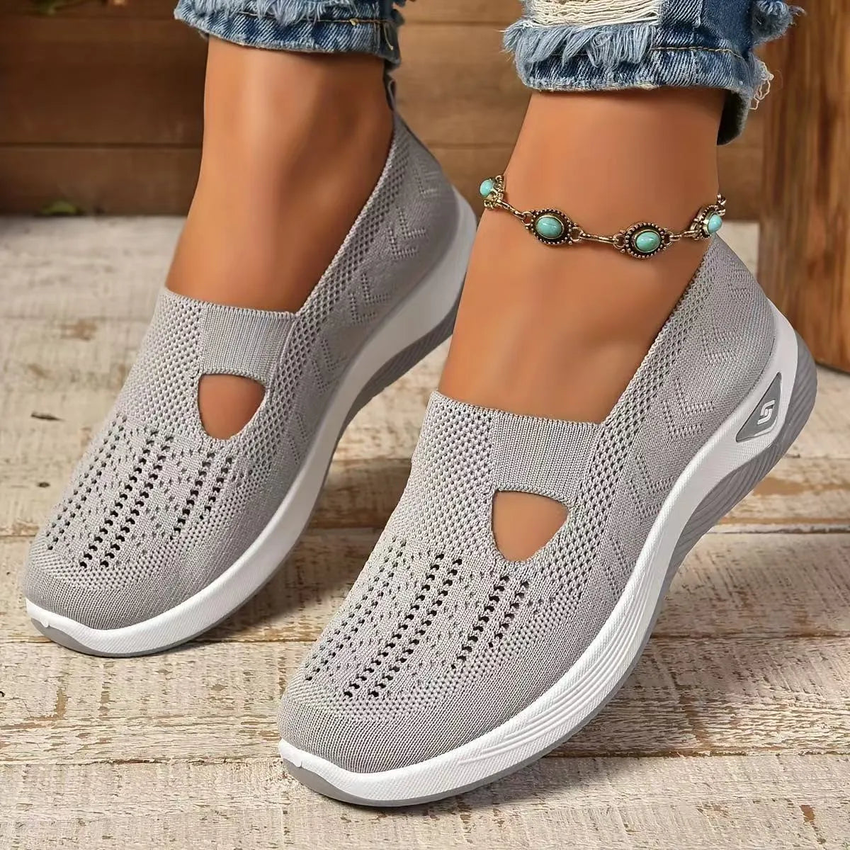 Women's casual mesh shoes with T-strap design and soft PVC soles in light purple colour
