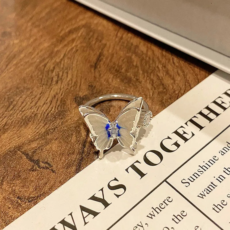 Copper women's ring featuring a creative Chinese butterfly design, available in multiple colours.
