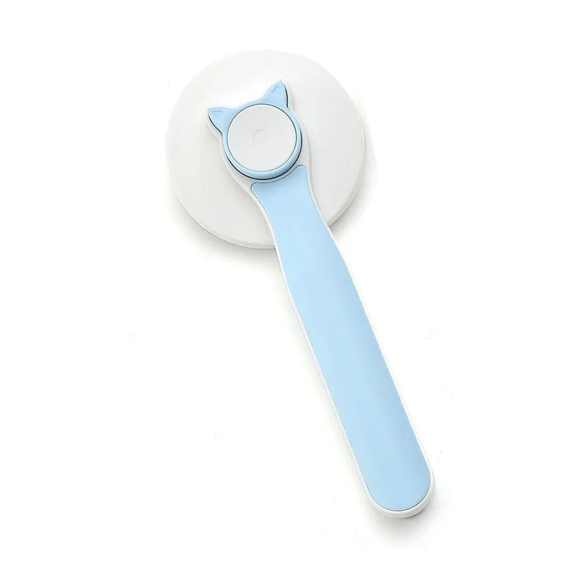 Blue self-cleaning pet grooming brush with ergonomic rubber handle on a white background