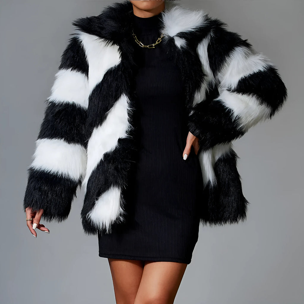 Women's faux fur coat with contrasting lapel detail and a detachable fur collar.