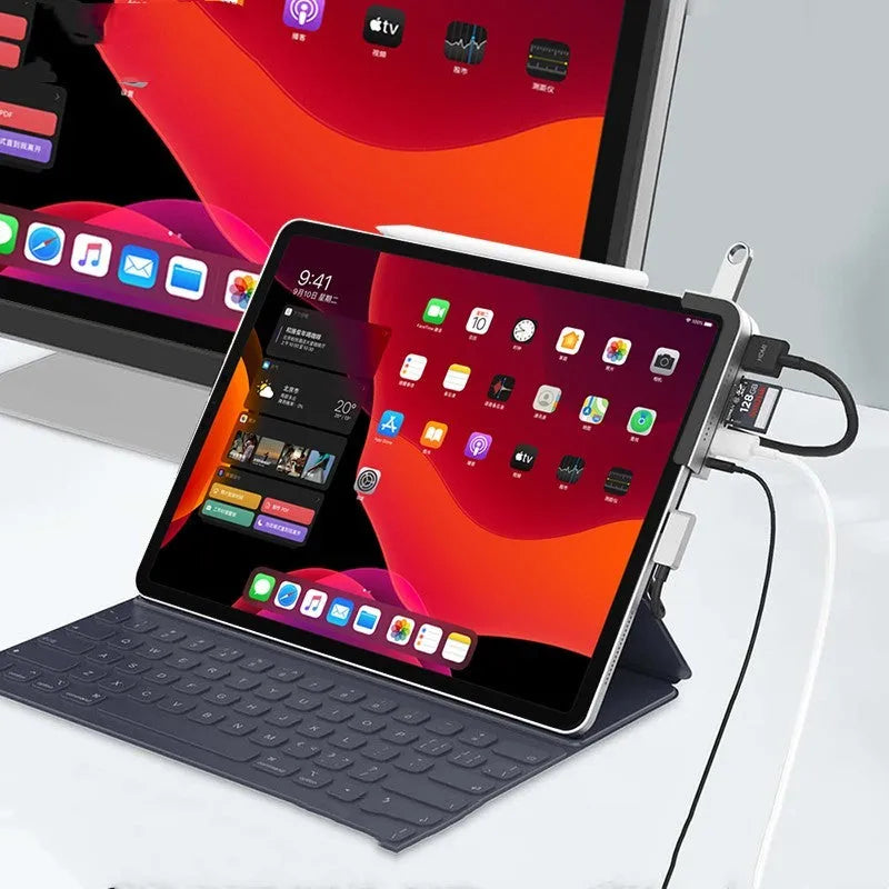 Silver aluminium grey USB-C 6-in-1 docking station for iPad Pro models with multiple ports.