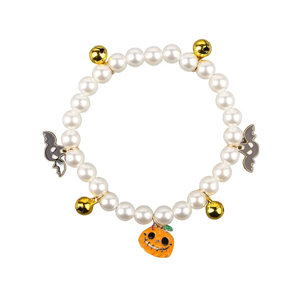 Halloween cat collar with simulated pearl necklace and purple ghost pumpkin ornament