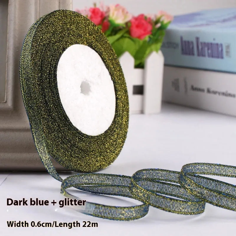 Roll of polyester gift ribbon showing 0.6cm width and multiple colour options including metallic finishes