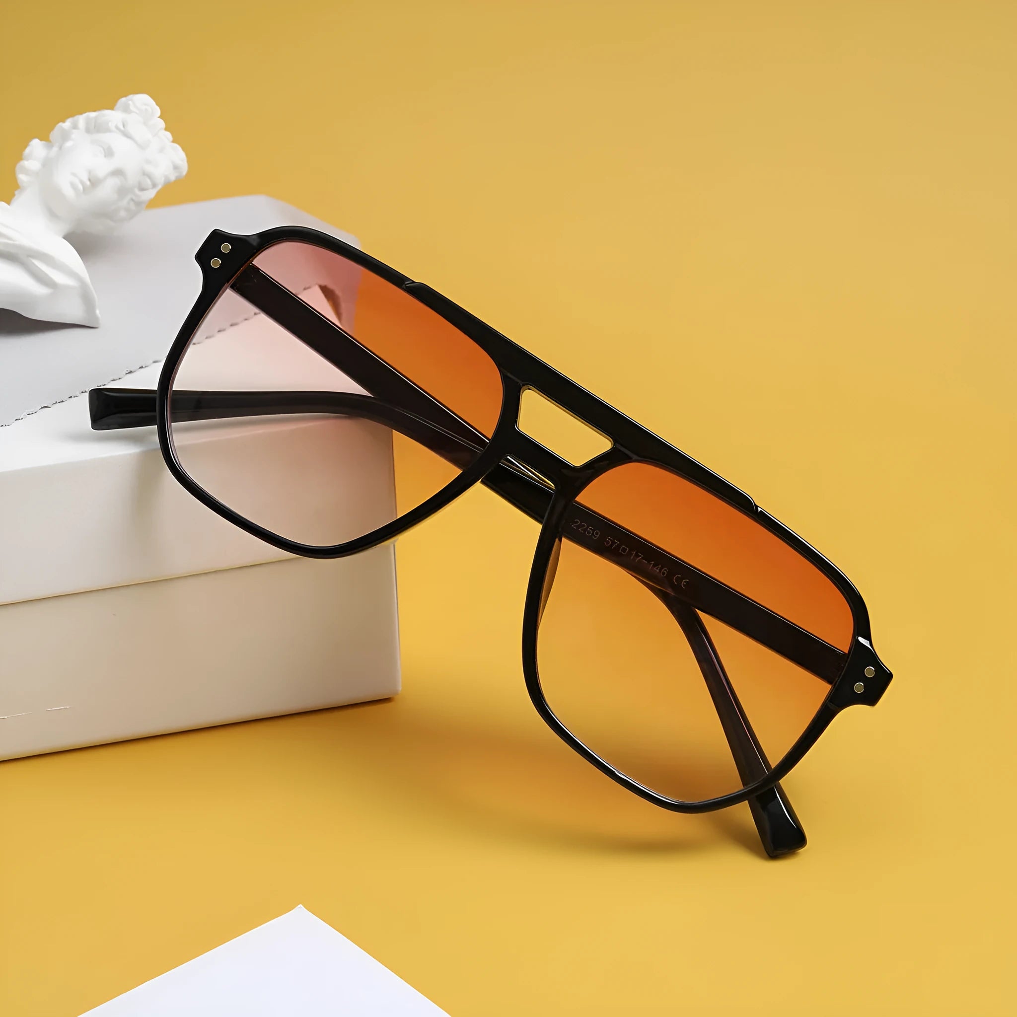 Square double beam full frame sunglasses for women in black frame with pink lenses.