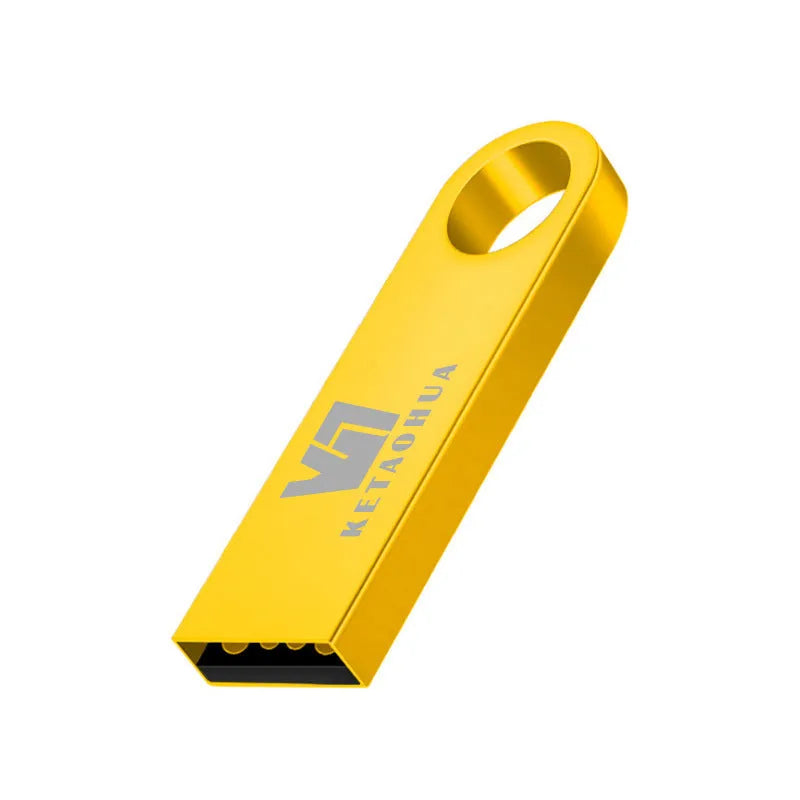 Silver metal car-shaped USB flash drive on a white background