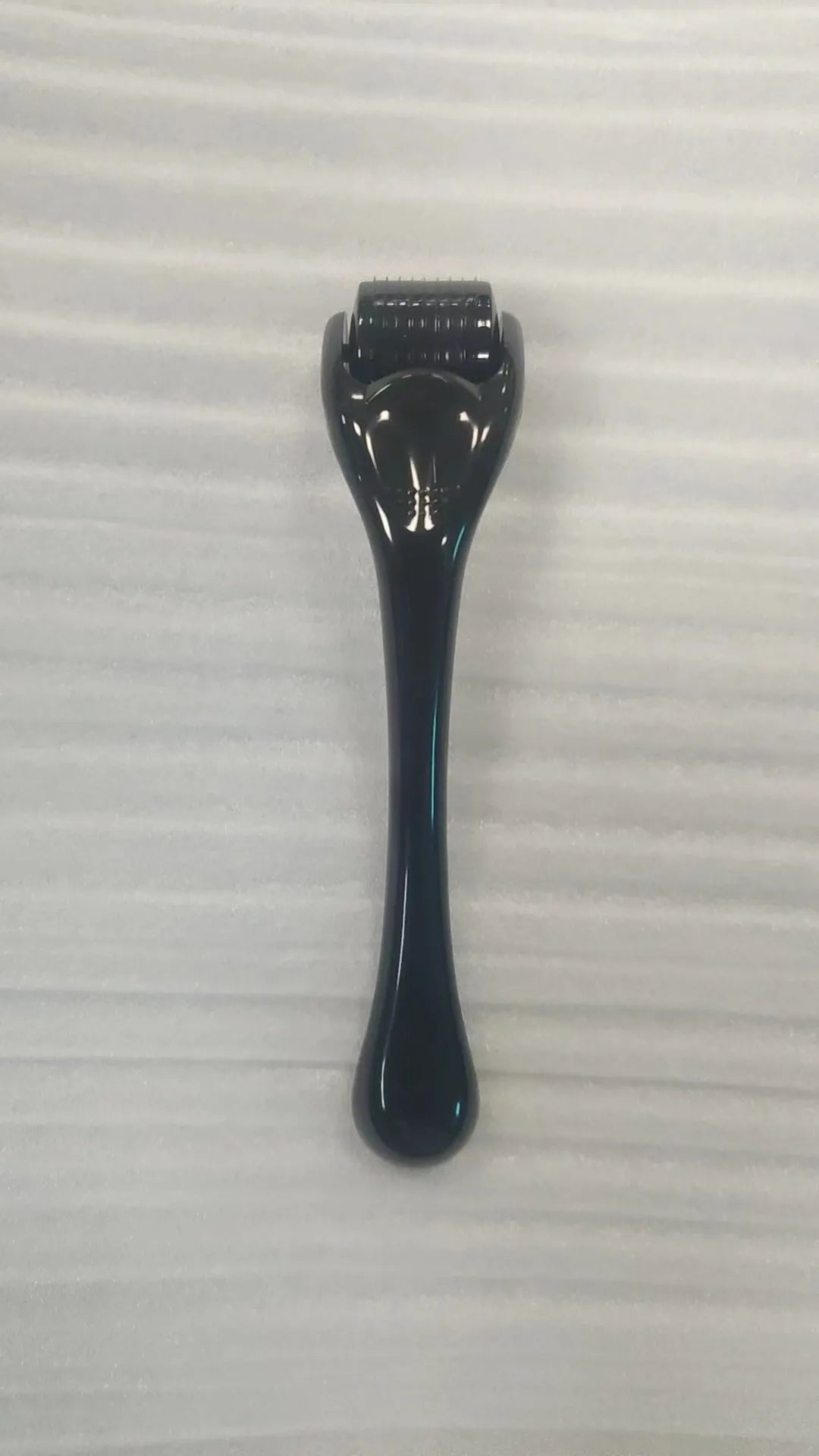 540 micro needle dermaroller roller with black handle and coloured wheel showing needle specification