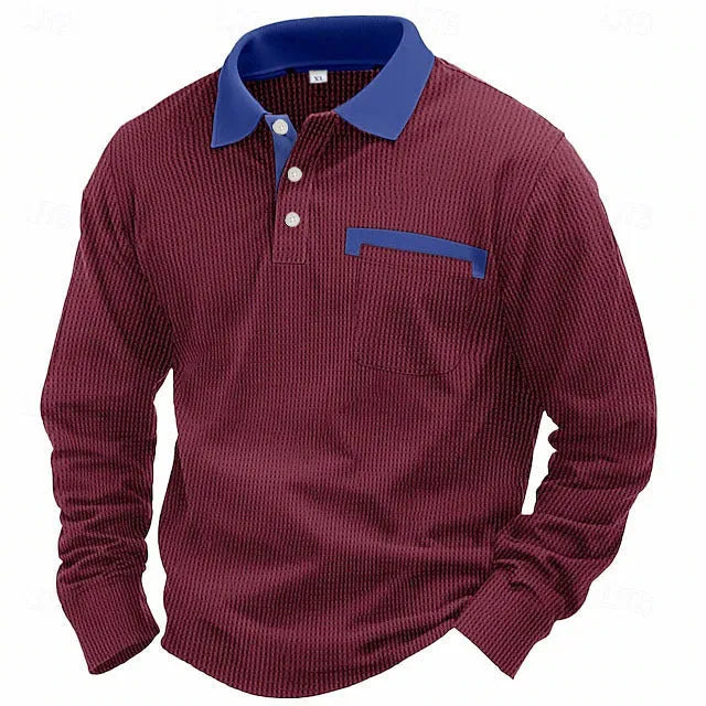 Man wearing a long-sleeved waffle texture polo shirt in a loose fit, showcasing the asymmetric detail.