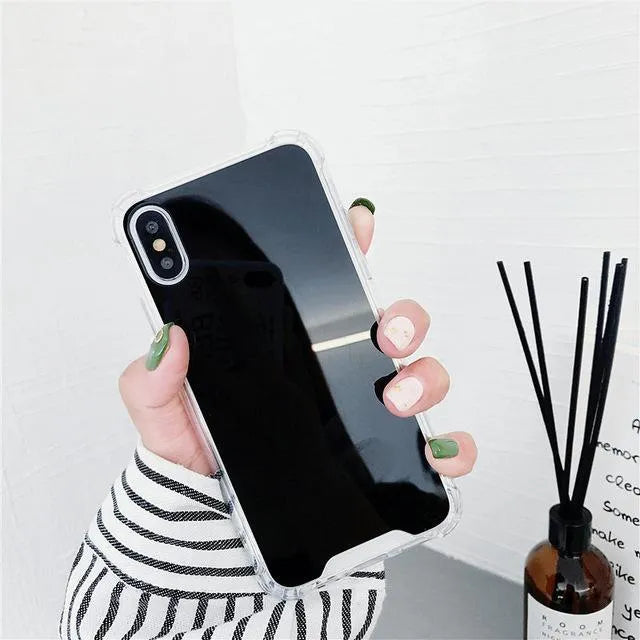 Mirror finish protective TPU case for iPhone shown in various colours.